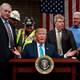 Here is the president signing the orders.